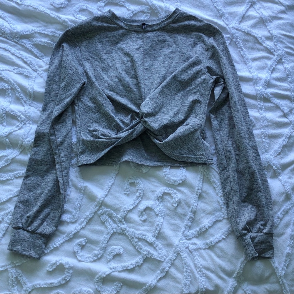 Grey cropped long sleeve top with knot front